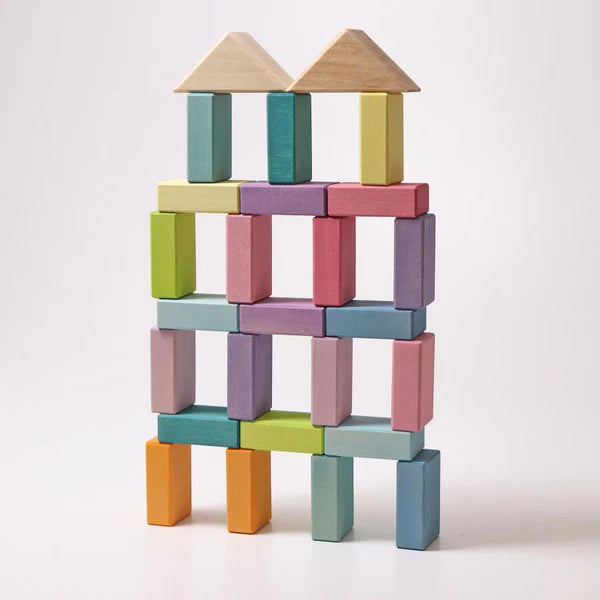 Grimm's Pastel Duo - Classic Building Blocks on a wooden tray